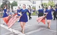  ?? Hearst Connecticu­t Media file photo ?? The Brookfield High School Marching Band and Color Guard performs in last year’s Brookfield Memorial Day parade.