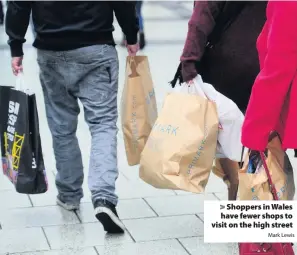  ?? Mark Lewis ?? > Shoppers in Wales have fewer shops to visit on the high street