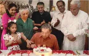  ??  ?? Dr. Verghese Kurien cuts a cake on his 90th Birthday