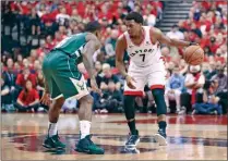  ?? (AFP) ?? Toronto Raptors Kyle Lowry dribbles against Milwaukee Bucks Eric Bledsoe during the second half in game four of the NBA Eastern Conference Finals at Scotiabank Arena in Toronto on Tuesday.