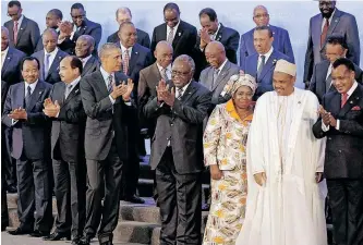  ?? ?? US PRESIDENT Barack Obama posed with other leaders for a group photo at the Us-africa Leaders Summit in Washington in 2014. Pictured in the front row, from left, are Cameroon’s President Paul Biya, Mauritania’s President Mohamed Ould Abdel Aziz, Obama, Namibia’s President Hifikepuny­e Pohamba and AU Commission Chairperso­n Nkosazana Dlamini Zuma, Comoros’s President Ikililou Dhoinine and Congo’s President Denis Sassou Nguesso. | REUTERS