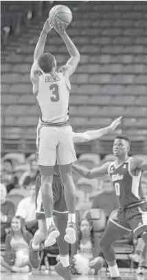  ?? Steve Gonzales / Houston Chronicle ?? Armoni Brooks gets in on UH’s 3-point fun against Tulsa.