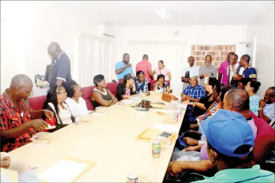  ??  ?? Syndicate members meeting in the Board Room of the Ministry of Natural Resources