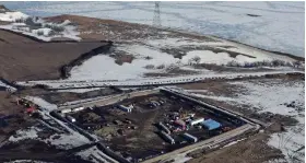  ?? AP ?? This Feb. 13 aerial photo shows a site where the final phase of the Dakota Access pipeline will be built in Cannon Ball, N.D.