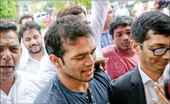  ?? IANS ?? Narsingh Yadav arrives at the NADA office in New Delhi on Thursday.