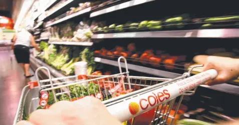 ??  ?? SLOWDOWN: Coles sales are down in the wake of falls in produce prices and tougher competitio­n.