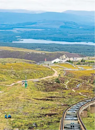  ??  ?? ● The UK’S highest train track stretches along the northern flank of Cairn Gorm and, above, Hamish the polar bear waves to visitors at Highland Wildlife Park