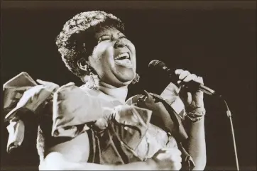  ?? (Courtesy Image/FSRAM) ?? Michael P. Smith’s “Aretha Franklin at the New Orleans Jazz & Heritage Festival” (1994), a giclee print on paper, was the gift of Louis and Suzie Meluso.