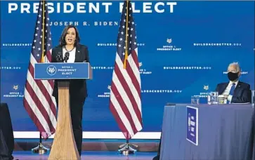  ?? Andrew Harnik Associated Press ?? VICE PRESIDENT-ELECT Kamala Harris is already sharing in President-elect Joe Biden’s spotlight and decision-making, but other Democrats will be closely scrutinizi­ng her for signs of too much ambition.