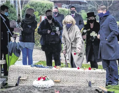  ?? PHOTO: COLIN KEEGAN/COLLINS ?? ‘Good and honest’: Steve McCarthy and his wife Bernie (above); mourners follow the funeral service (left).