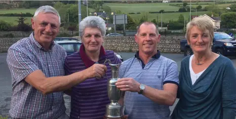  ??  ?? Paddy Mulligan’s family presenting the winner of the Paddy Mulligan Cup to Brendan Finnerty outside Plucks on Saturday evening: from left - Ed Mulligan, Caroline Mulligan, Brendan Finnerty and Joy Burke.