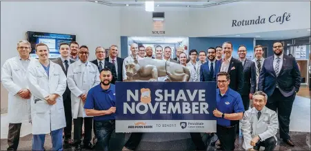  ?? SUBMITTED PHOTO ?? This photo shows Mid Penn Bank representa­tives and members of Penn State Cancer Institute’s Urology division at the kick of the 2019 No Shave November initiative. Mid Penn has set a 2020 goal of raising $100,000 for the cause, which focuses on prostate health.