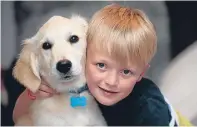  ??  ?? Mason and his four-legged lifesaver are inseparabl­e