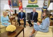  ?? OLIVIER DOULIERY / GETTY IMAGES ?? U.S. President Donald Trump and first lady Melania Trump meet with Israeli Prime Minister Benjamin Netanyahu and Sara Netanyahu in the Oval Office of the White House on Monday. The prime minister is on an official visit to the U.S. until the end of the...