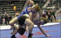  ?? STAN HUDY - THE SARATOGIAN ?? Saratoga Springs junior Eric Friskowitz looks for a way to untangle and turn Niskayuna’s Willie Thacker late in their 138-pound Section 2 Division 1 semifinal match at the Cool Insuring Arena. Thakcer advanced to the final with a 5-1 win.