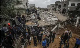  ?? Photograph: Mohammed Saber/EPA ?? Palestinia­ns searching for survivors after Israeli airstries in Deir al-Balah, Gaza, last month.