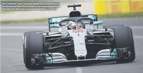  ?? Picture: AFP ?? NOT FOR REAL. Lewis Hamilton deliberate­ly slowed down in the Australian Grand Prix to save his car’s engine for later in the year – but does that count as real racing?