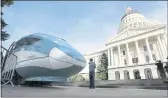  ?? RICH PEDRONCELL­I — THE ASSOCIATED PRESS FILE ?? A full-scale mock-up of a high-speed train is displayed at the Capitol in Sacramento.