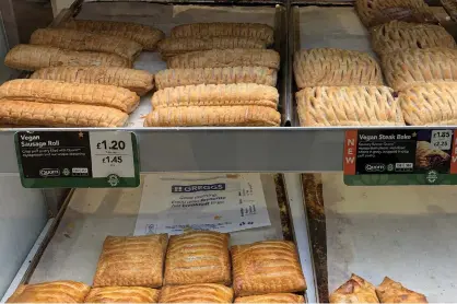  ?? (Phil Noble/Reuters) ?? VEGAN SAUSAGE rolls and steak bakes available for sale in a bakery near Manchester, UK.