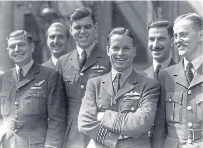  ?? Picture: Keystone/getty Images. ?? Wing Commander Guy Gibson VC with members of 617 Squadron.