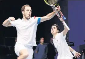  ?? FOTO: AP ?? Punto vital El que lograron ayer en el doble Hughes-Herbert y Gasquet