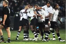  ?? Photo / Photosport ?? Fiji celebrate a rare try against the All Blacks in 2011.