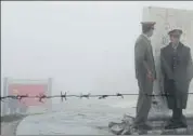  ?? HT FILE ?? Chinese army personnel stand guard at Nathu La pass . Faceoff between the two neighbours erupted in early June in an area along Sikkim border, which China calls Donglang.