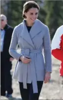  ?? GETTY IMAGES FILE PHOTO ?? Catherine, Duchess of Cambridge, shown strolling near Carcross, B.C. during the Royal Tour of Canada in September 2016, wears a coat by Canadian designer Bojana Sentaler.