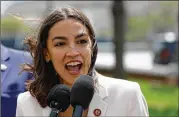  ?? YURI GRIPAS/ABACA PRESS/TNS ?? U.S. Rep. Alexandria Ocasio-cortez, D-new York, is among the leaders of a progressiv­e coalition pushing for changes in President Biden’s $2.3 trillion infrastruc­ture initiative.