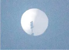  ?? — AFP photo ?? A suspected Chinese spy balloon in the sky over Billings, Montana.