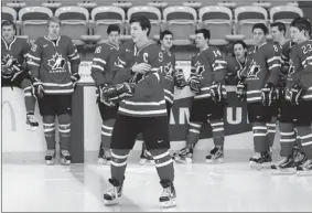  ?? JEFF MCINTOSH/ THE CANADIAN PRESS ?? Newly minted captain Ryan Nugent-Hopkins takes centre ice during a photo session after the naming of the team at the national juniors selection camp in Calgary Friday.