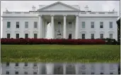  ?? CAROLYN KASTER — THE ASSOCIATED PRESS FILE ?? The White House in Washington is seen reflected in a puddle on Sept. 3, 2022.