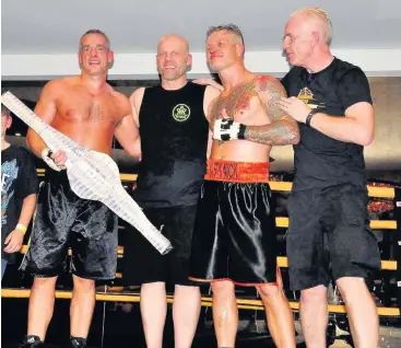  ??  ?? Jon Lund (far right) pictured with winner of the Prizefight­er Lee Crossland (far left), his opponent on the night Ryan Rhodes (left centre) and Prizefighe­r runner-up Nick Grady