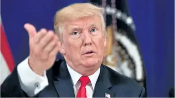  ?? NICHOLAS KAMM/GETTY IMAGES ?? This file photo taken on August 10, shows U.S. President Donald Trump during a security briefing at his Bedminster National Golf Club in New Jersey. Trump once again upped the ante in his war of words with North Korea, warning Pyongyang that the U.S....