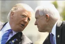  ?? Evan Vucci / Associated Press ?? President Trump talks with Attorney General, Jeff Sessions, who will face questions on his meetings with Russian officials.