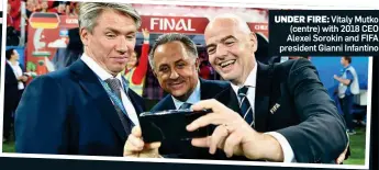  ??  ?? UNDER FIRE: Vitaly Mutko (centre) with 2018 CEO Alexei Sorokin and FIFA president Gianni Infantino