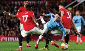  ??  ?? Manchester United take on Manchester City, on 8 March. The Premier League hopes to resume in June. Photograph: Javier García/BPI/Shuttersto­ck