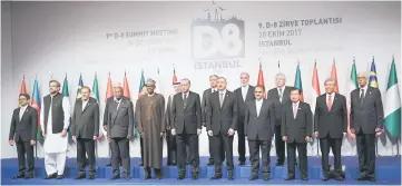  ??  ?? Erdogan (front row, centre) together with Ahmad Zahid (second right) and other delegates during a photo session during the D-8 summit in Istanbul. — Bernama photo