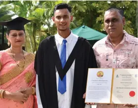  ?? Photo: Royal Photograph­y ?? Nelvish Singh with his parents Nilend Singh and Devina Singh at Grand Eastern Hotel in Labasa on May 15, 2022.