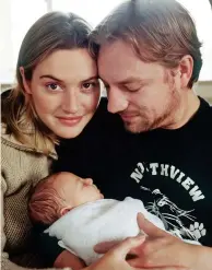  ?? ?? A star is born: Mia with her parents in 2000