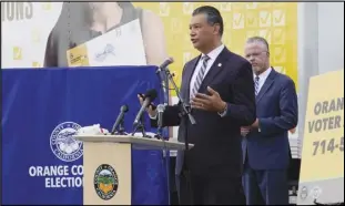  ?? DAMIAN DOVARGANES/AP ?? California Secretary of State Alex Padilla (left) and Orange County Registrar of Voters Neal Kelley hold a news conference on Orange County’s comprehens­ive plans to safeguard the election and provide transparen­cy in Santa Ana, Calif on Oct. 5.