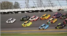  ?? [NEWS-JOURNAL/STEVEN NOTARAS] ?? Brad Keselowski, driving the No. 2 Ford, leads the 2018 Daytona 500 field over the 2.5-mile tri-oval.