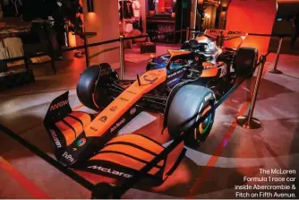  ?? ?? The McLaren Formula 1 race car inside Abercrombi­e & Fitch on Fifth Avenue.