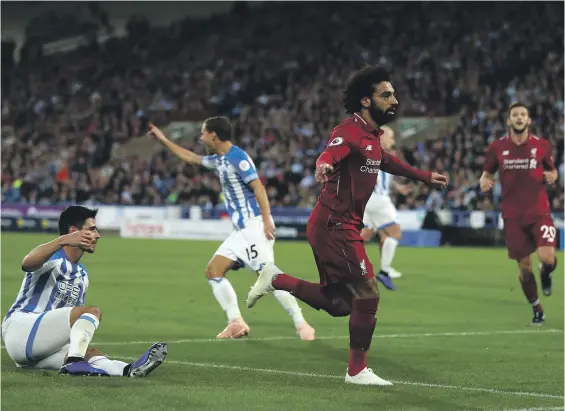  ?? Getty ?? Mohamed Salah scored his fourth goal of the season as Liverpool beat Huddersfie­ld Town