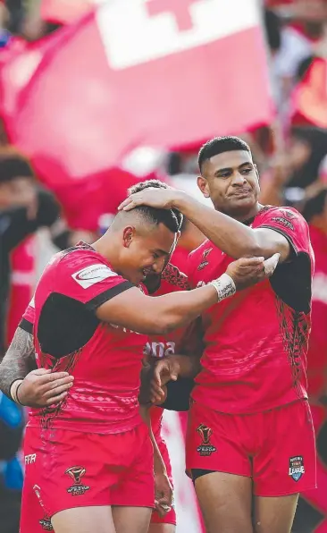  ?? Picture: GETTY IMAGES ?? WON THE WAR: Daniel Tupou of Tonga celebrates with team mates during their win over New Zealand at Waikato Stadium on Saturday.