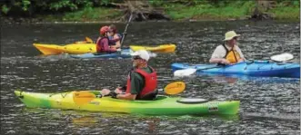  ??  ?? Kayakers paddle from Amity Township to Riverfront Park.