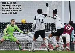  ??  ?? GO AHEAD: Rodriguez nips in as he meets Cork’s cross to make it 1-0