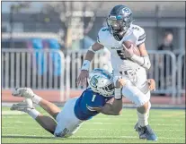  ?? KARL MONDON/BAY AREA NEWS GROUP ?? Bellarmine quarterbac­k Nate Escalada (5) is tackled by Serra’s Danny Niu (1) on Saturday in San Mateo.