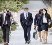  ?? Irfan Khan Los Angeles Times ?? FORMER L.A. City Councilman Jose Huizar, center, arrives at the federal courthouse downtown in August 2020. He has pleaded not guilty to corruption charges.