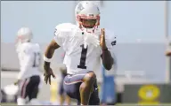  ?? Steven Senne / Associated Press ?? New England Patriots wide receiver Antonio Brown works out during practice on Wednesday in Foxborough, Mass. Brown to practiced with the team for the first time on Wednesday afternoon, a day after his former trainer filed a civil lawsuit in the Southern District of Florida accusing him of sexually assaulting her on three occasions.